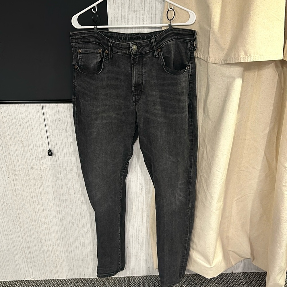 Gently used American Eagle black skinny jeans size 38x34